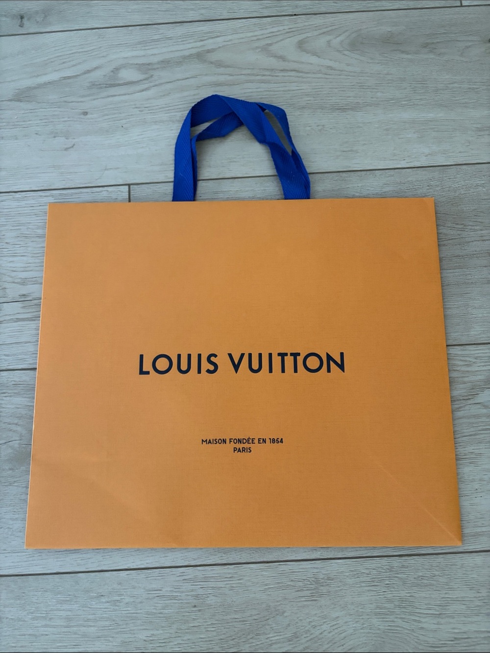 Louis Vuitton Orange Shopping Bag with Blue Ribbon Handles